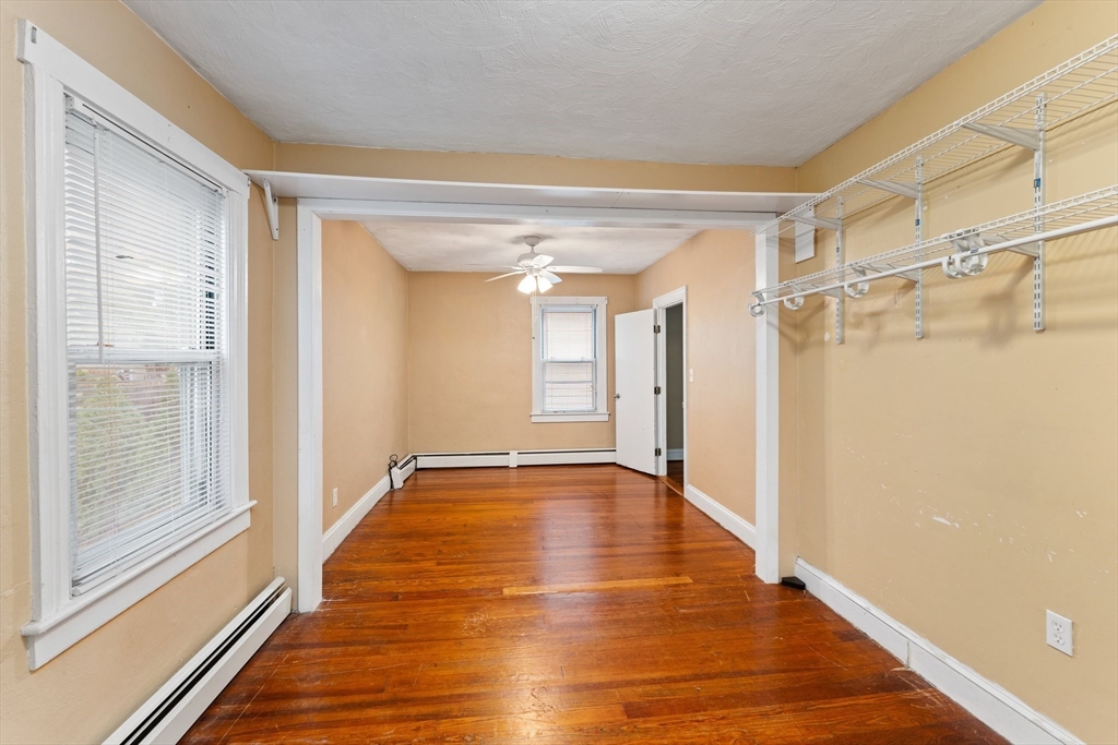 185 West Avenue Pawtucket, RI 02860 - Photo 12 of 40 a view of an empty room with wooden floor and a window