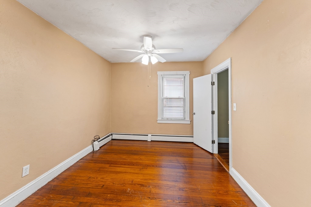 185 West Avenue Pawtucket, RI 02860 - Photo 14 of 40 a view of a room with wooden floor and a ceiling fan