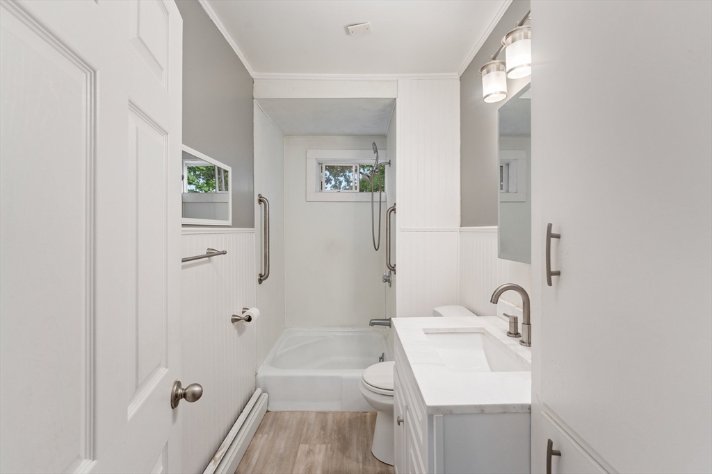 185 West Avenue Pawtucket, RI 02860 - Photo 15 of 40 a bathroom with a sink a toilet and shower