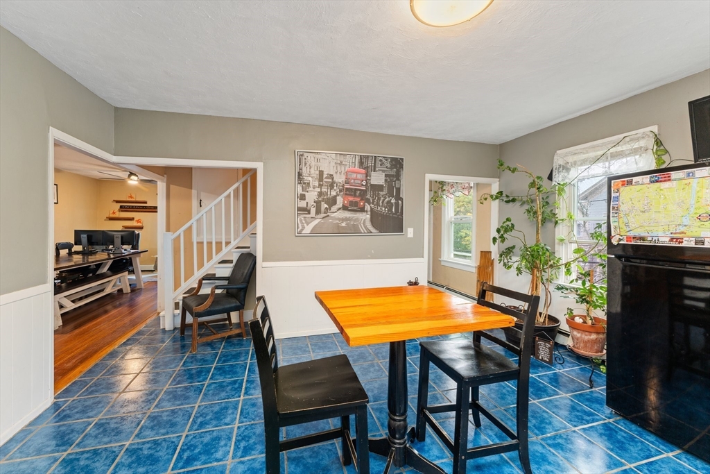 185 West Avenue Pawtucket, RI 02860 - Photo 21 of 40 a room with furniture and a flat screen tv