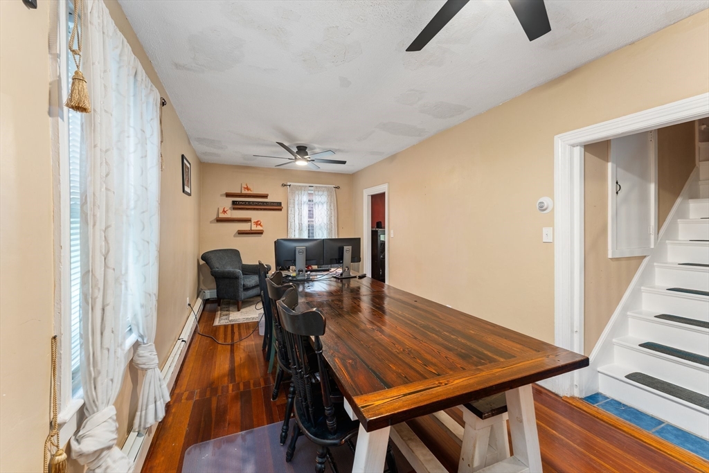 185 West Avenue Pawtucket, RI 02860 - Photo 22 of 40 a dining room with furniture and wooden floor