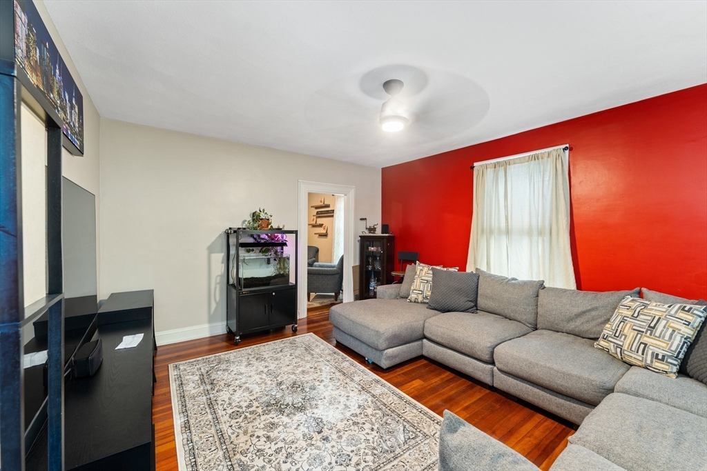 185 West Avenue Pawtucket, RI 02860 - Photo 24 of 40 a living room with furniture and a flat screen tv