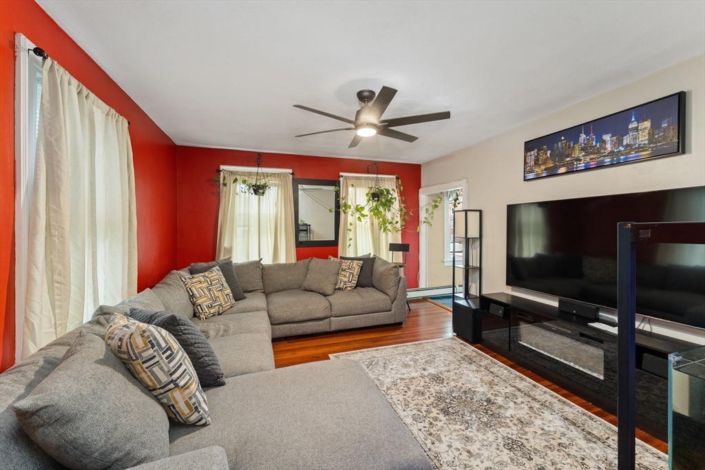 185 West Avenue Pawtucket, RI 02860 - Photo 25 of 40 a living room with furniture and a flat screen tv