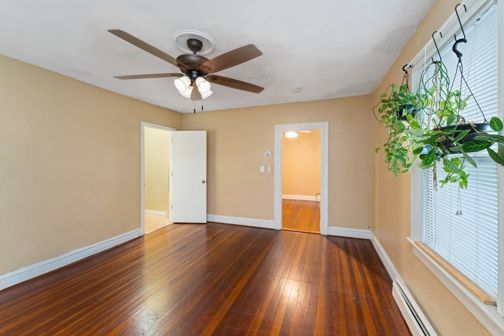185 West Avenue Pawtucket, RI 02860 - Photo 10 of 40 a view of an empty room with wooden floor