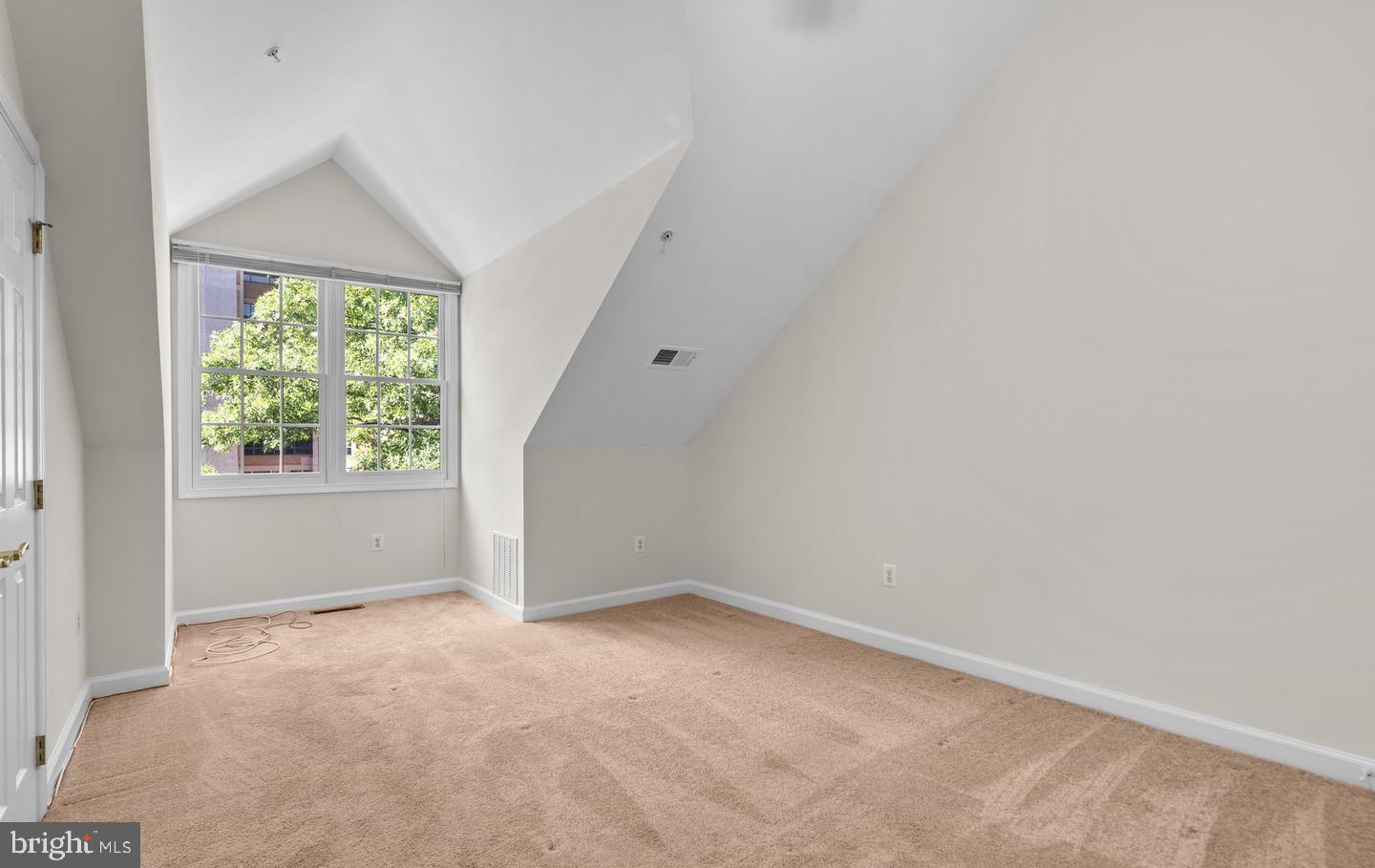 8509 2nd Avenue Silver Spring, MD 20910 - Photo 14 of 16 an empty room with a window