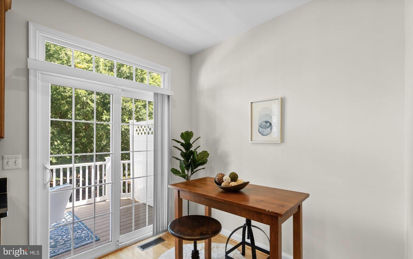 8509 2nd Avenue Silver Spring, MD 20910 - Photo 6 of 16 a table room with furniture and a potted plant