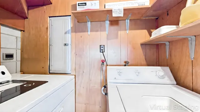 a bedroom with a bed and with chair