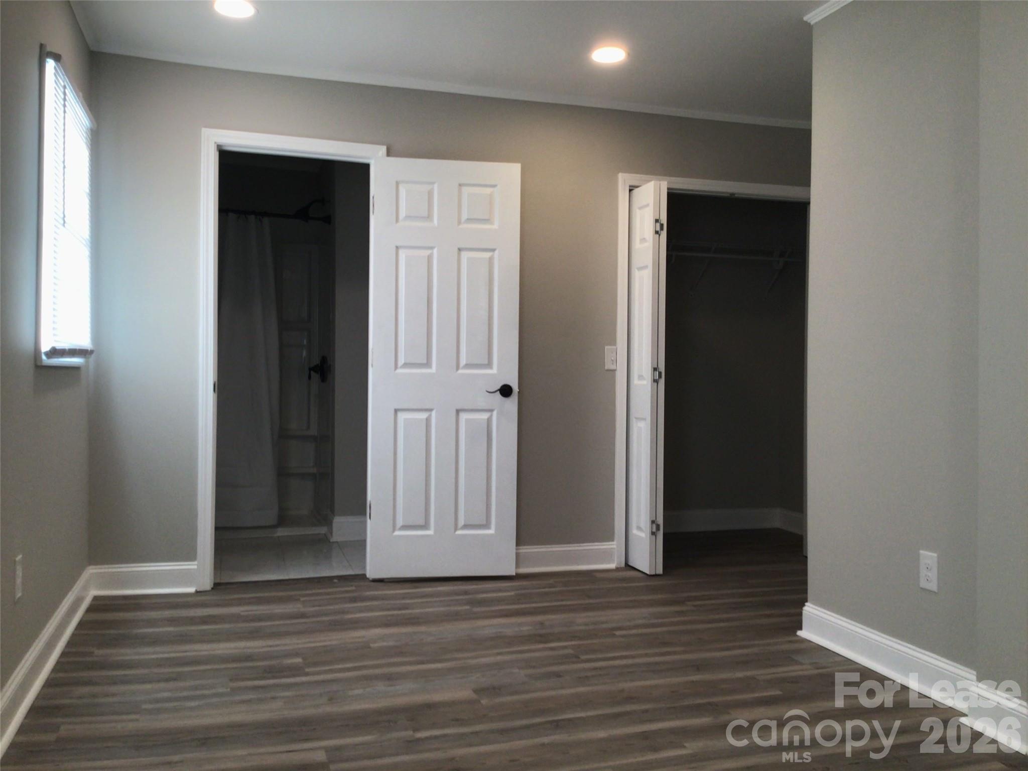 816 Margrace Road Kings Mountain, NC 28086 - Photo 7 of 13 an empty room with wooden floor and closet