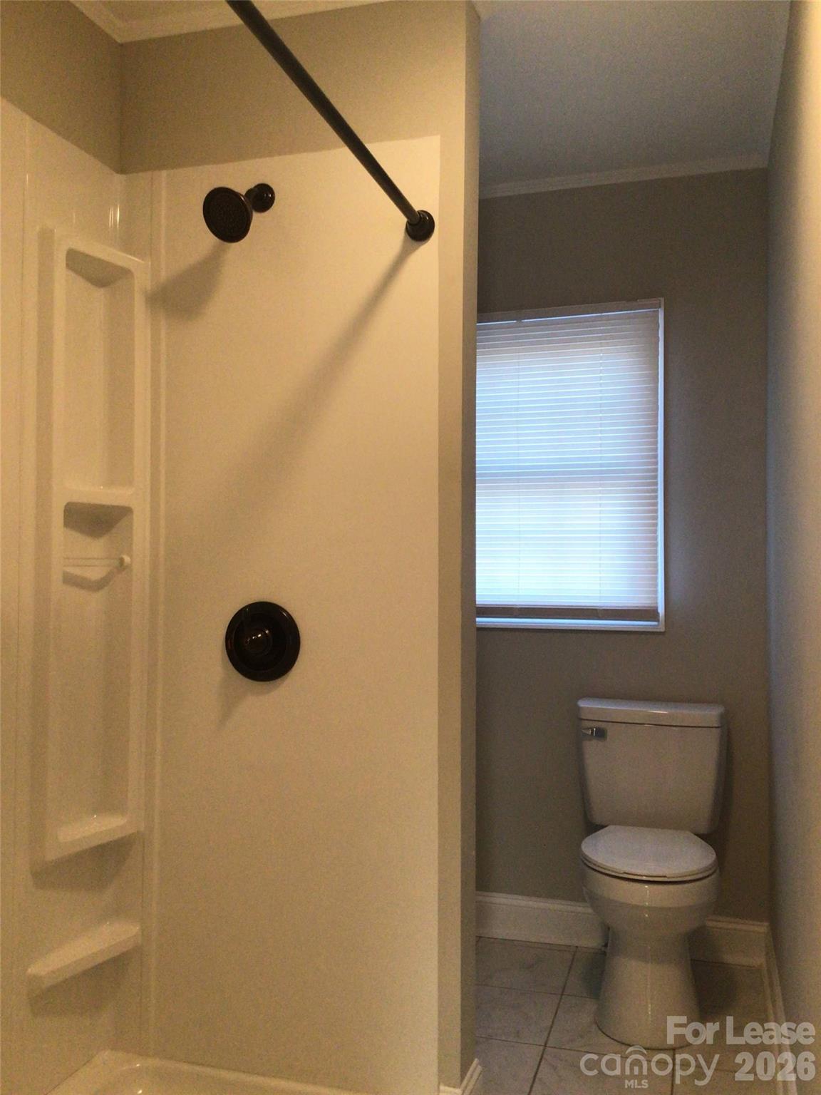 816 Margrace Road Kings Mountain, NC 28086 - Photo 10 of 13 a bathroom with a toilet sink and shower