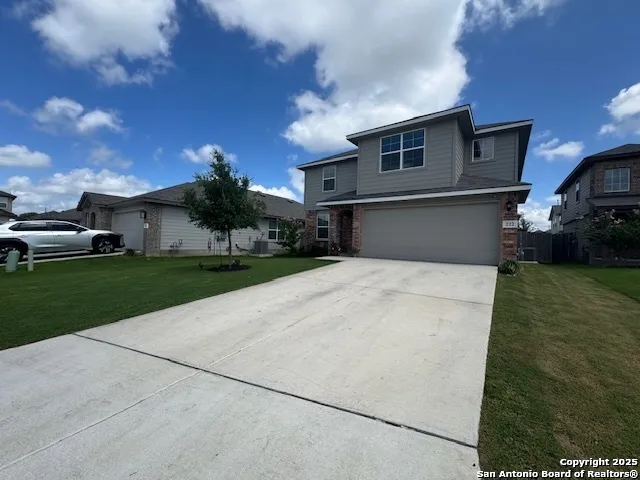 a front view of house with yard