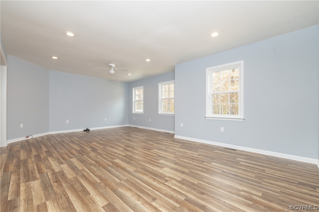2252 Cedar Hill Road Mineral, VA 23117 - Photo 13 of 35 a view of an empty room with wooden floor and window