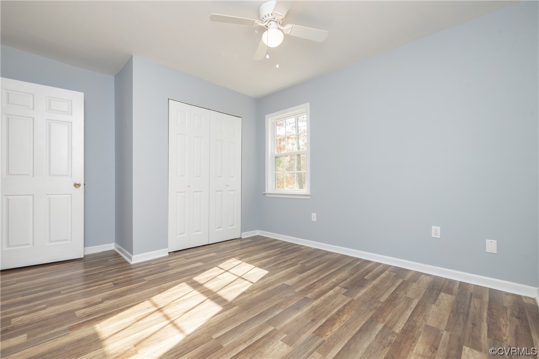 2252 Cedar Hill Road Mineral, VA 23117 - Photo 22 of 35 wooden floor in an empty room with a window