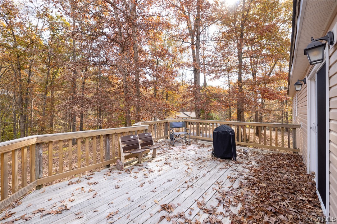 2252 Cedar Hill Road Mineral, VA 23117 - Photo 23 of 35 a view of roof deck with a barbeque and wooden stairs