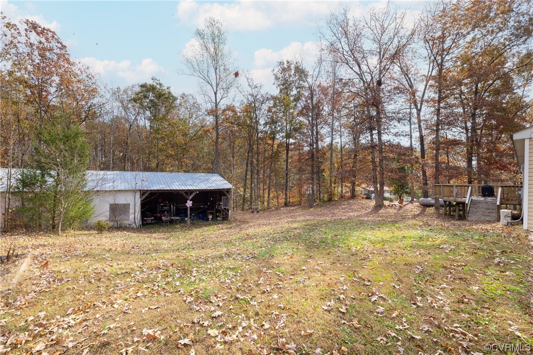 2252 Cedar Hill Road Mineral, VA 23117 - Photo 25 of 35 a view of a house with large trees and a big yard
