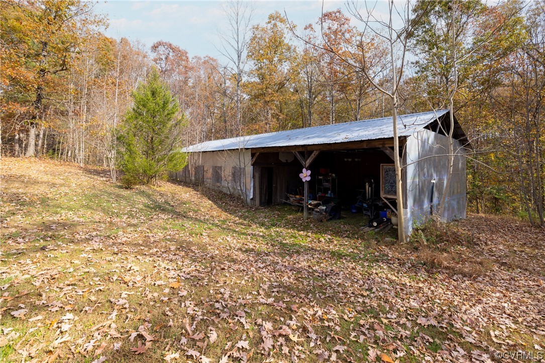 2252 Cedar Hill Road Mineral, VA 23117 - Photo 26 of 35 a view of a house with a yard and garage