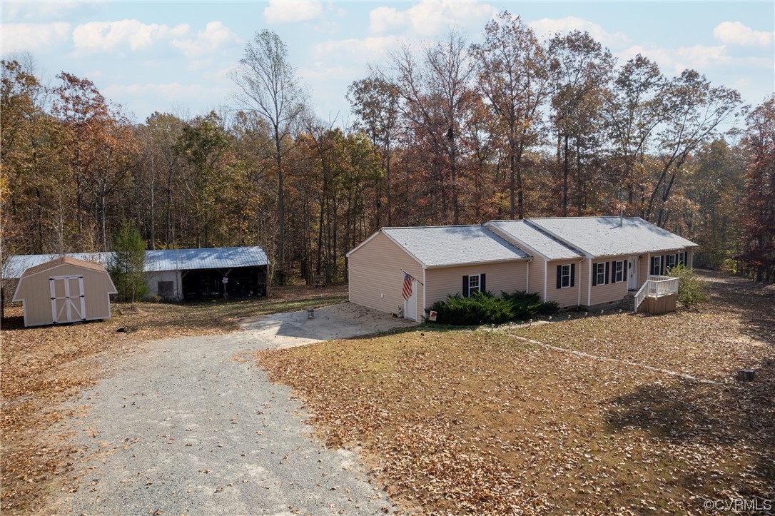2252 Cedar Hill Road Mineral, VA 23117 - Photo 30 of 35 a front view of a house with a yard and garage