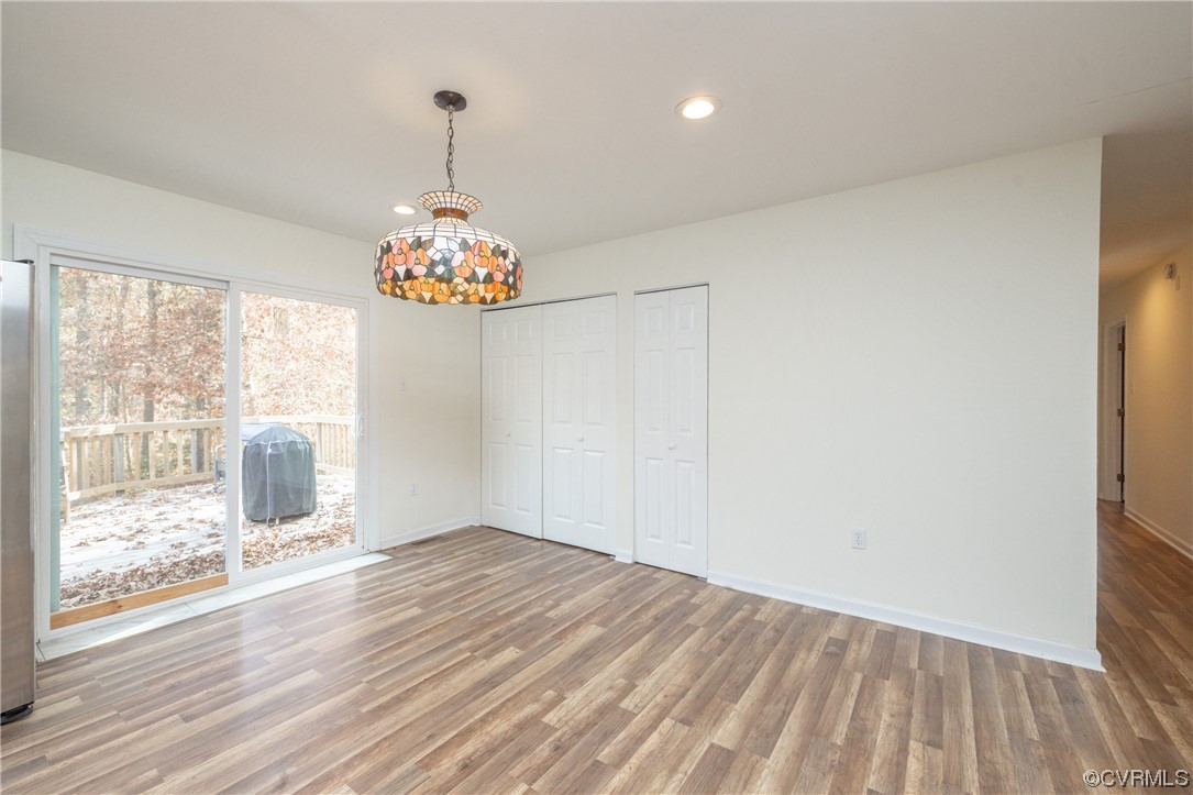 2252 Cedar Hill Road Mineral, VA 23117 - Photo 4 of 35 a very nice looking room with wooden floor and door