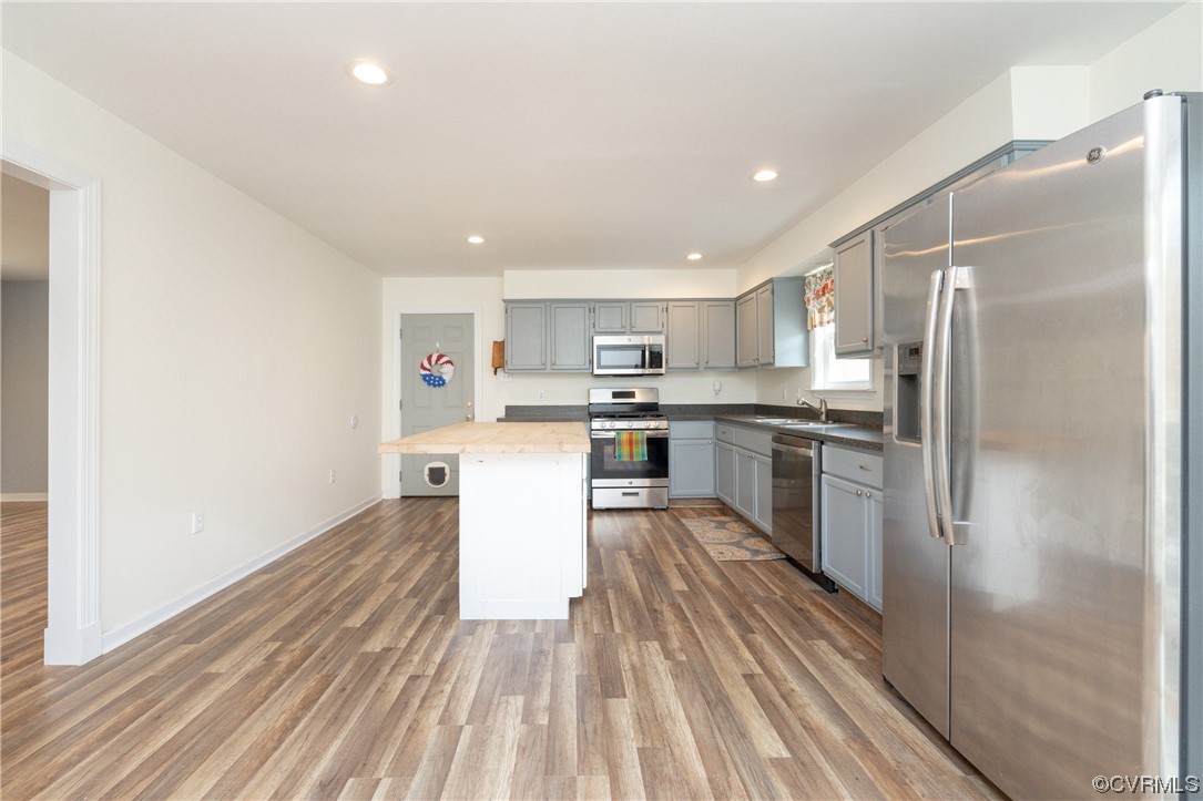 2252 Cedar Hill Road Mineral, VA 23117 - Photo 5 of 35 a kitchen with a sink stainless steel appliances cabinets and a counter top space
