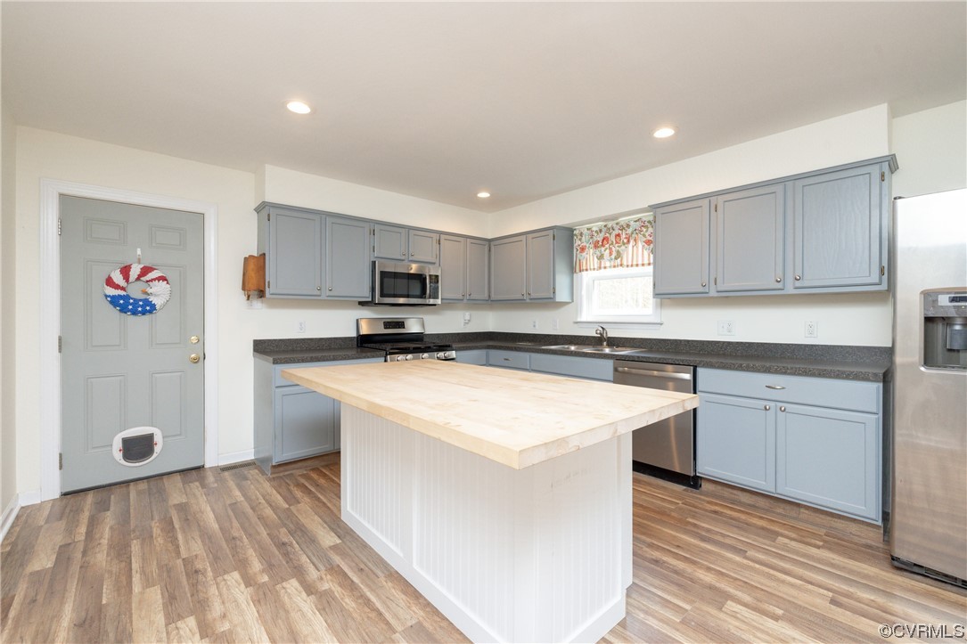2252 Cedar Hill Road Mineral, VA 23117 - Photo 6 of 35 a kitchen with stainless steel appliances granite countertop a sink and a stove top oven