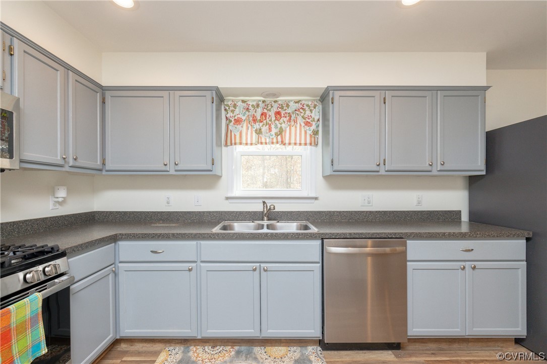 2252 Cedar Hill Road Mineral, VA 23117 - Photo 8 of 35 a kitchen with white cabinets appliances and a window