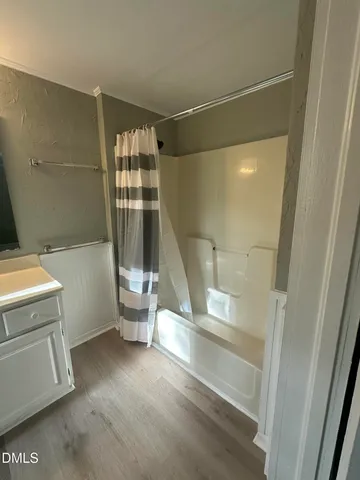 a bathroom with a sink and toilet