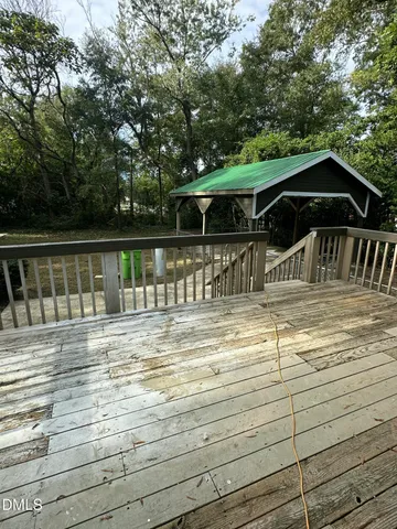 a view of a house with a ocean view