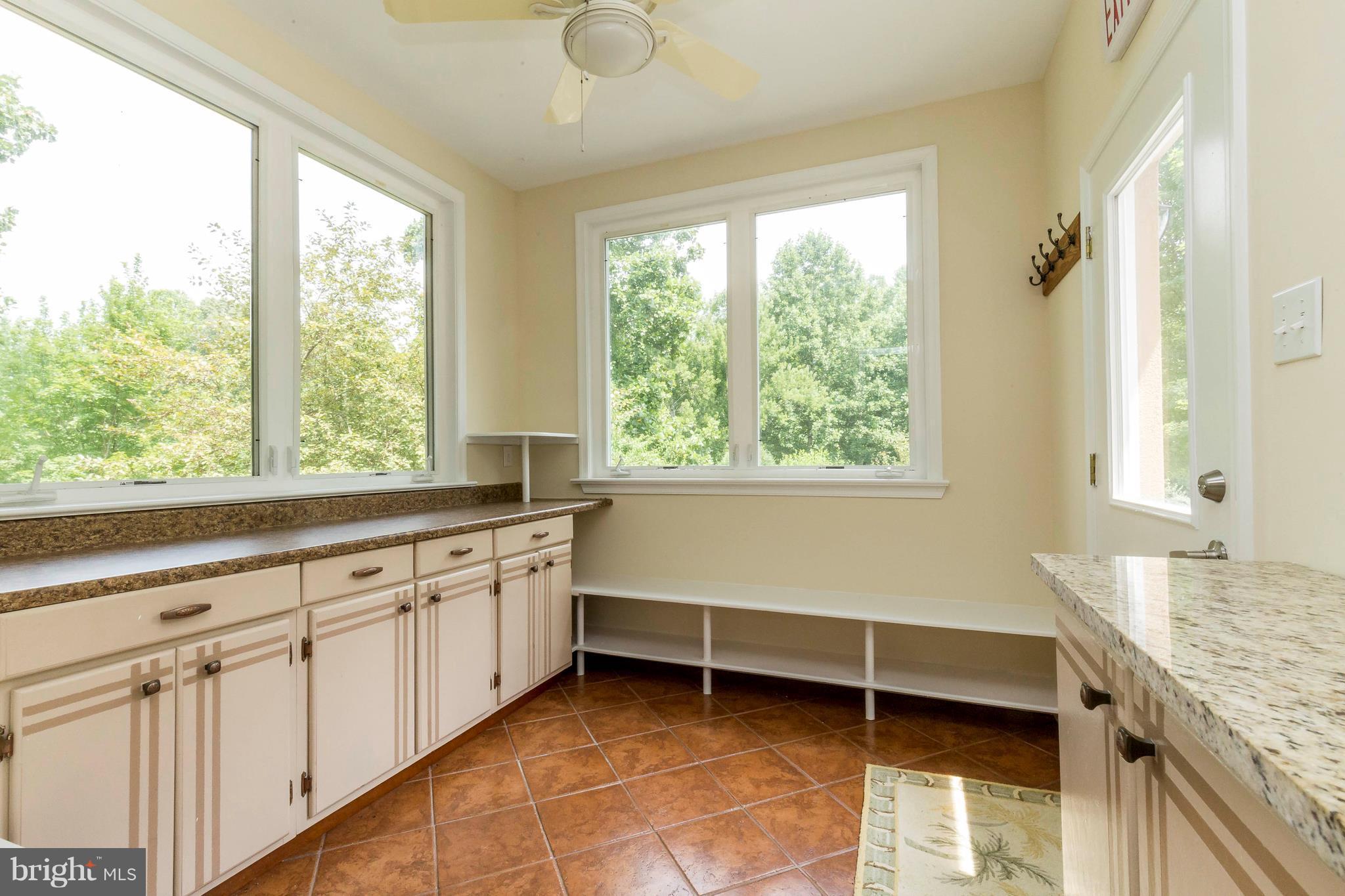 10242 Cliff Mills Road Marshall, VA 20115 - Photo 12 of 30 a kitchen with granite countertop a sink and a window
