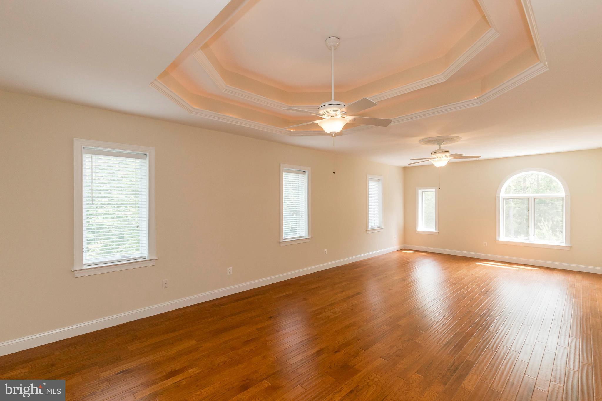 10242 Cliff Mills Road Marshall, VA 20115 - Photo 14 of 30 a view of an empty room with wooden floor and a window