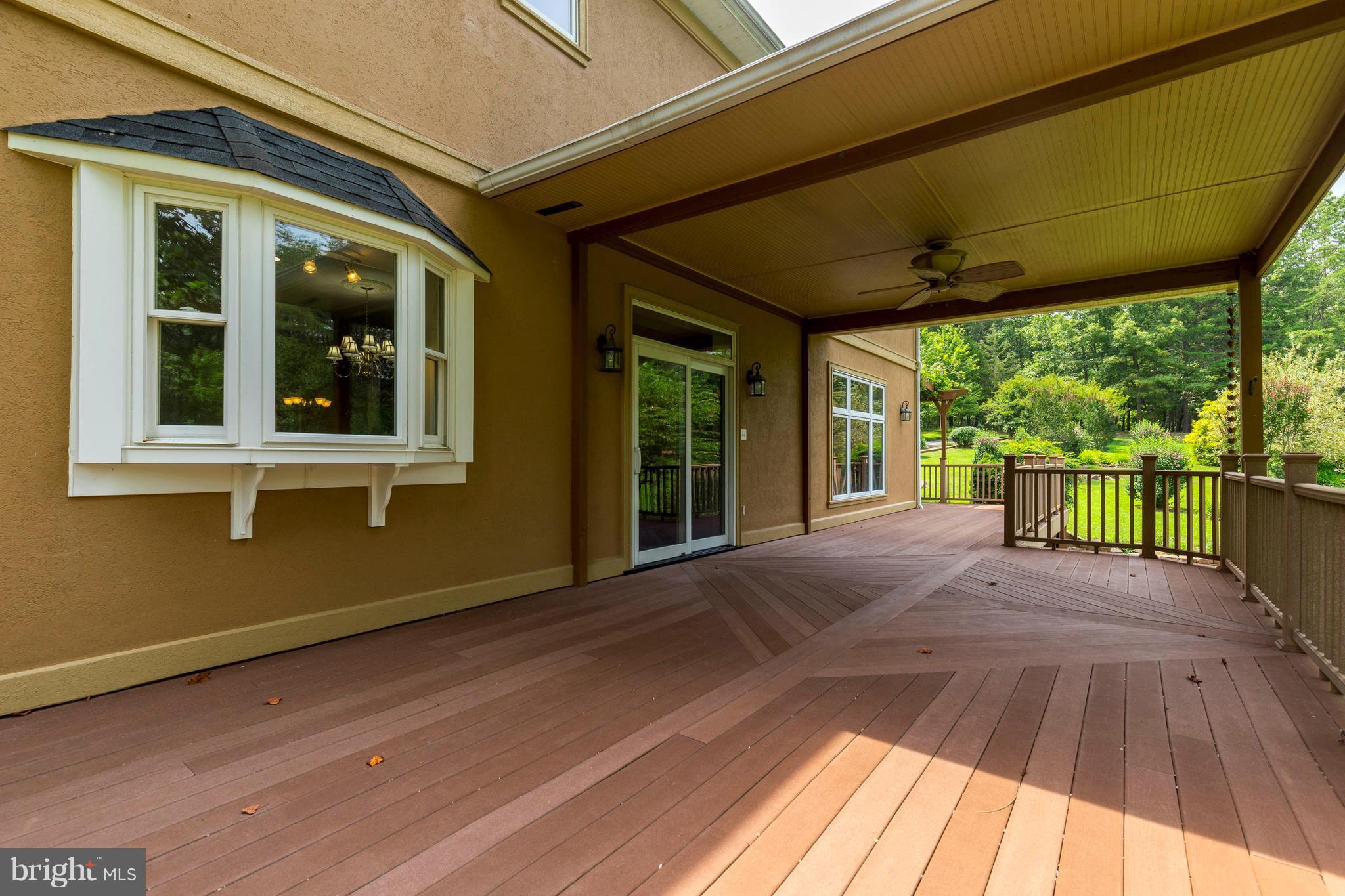 10242 Cliff Mills Road Marshall, VA 20115 - Photo 27 of 30 a view of a house with porch and wooden floor