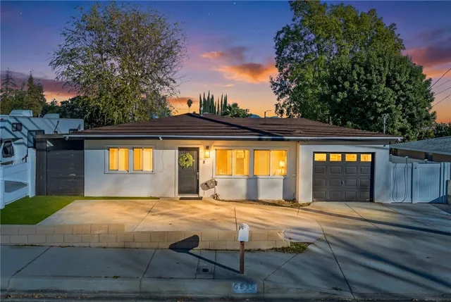 a view of swimming pool with a outdoor seating