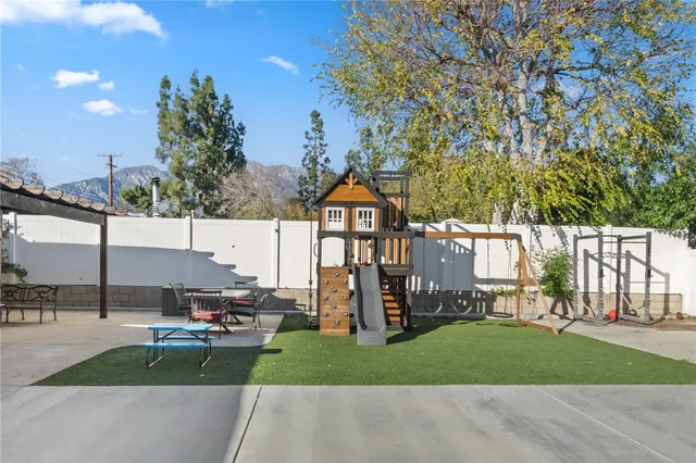 a view of a street with a building in the background