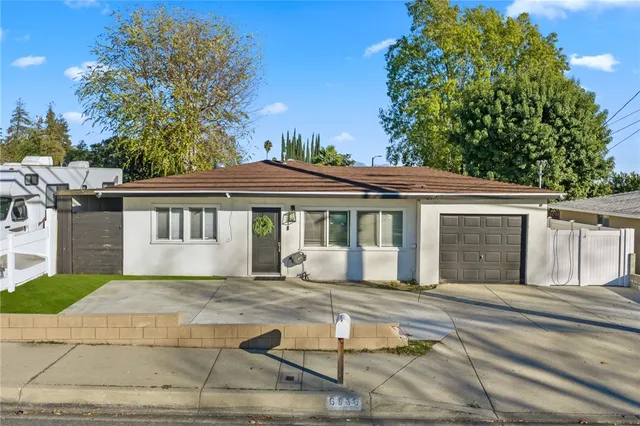 a view of a house with a garage