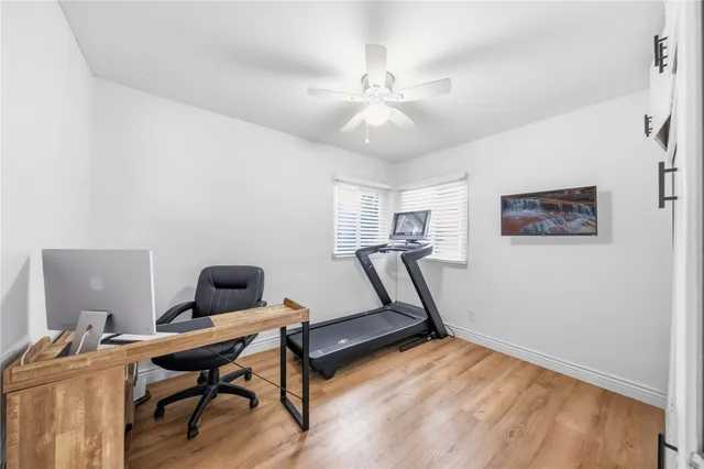 a kitchen with counter top space a sink appliances and cabinets