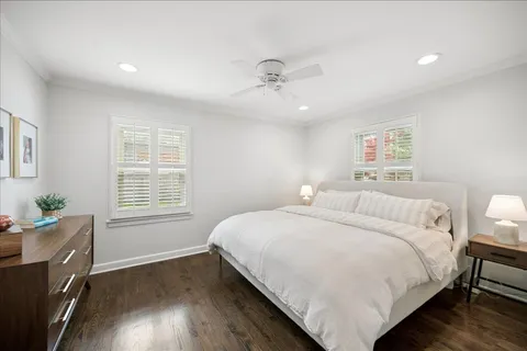 a bed room with a bed and a tv