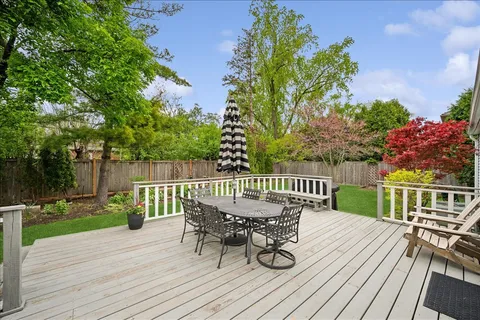 a view of a deck with furniture