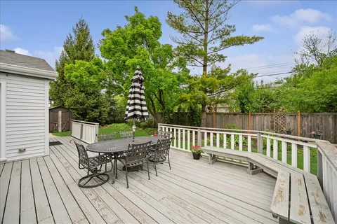 a view of a chairs on deck and wooden floor