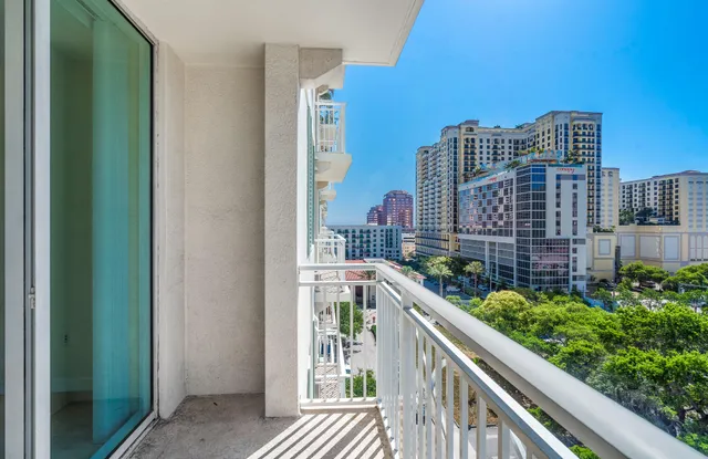 a view of a balcony with city view