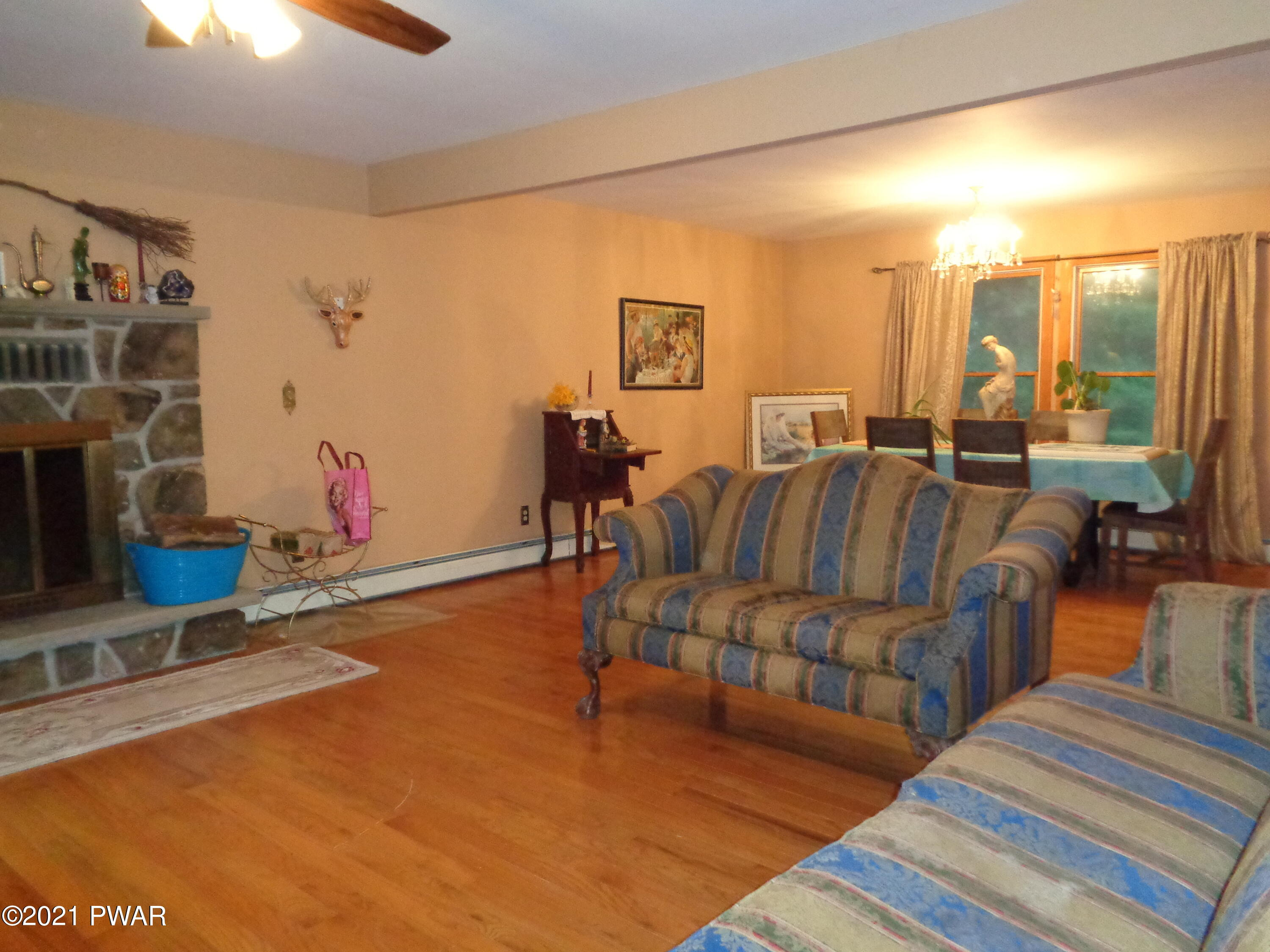 218 Towpath Road Hawley, PA 18428 - Photo 18 of 40 Living room with formal dining area