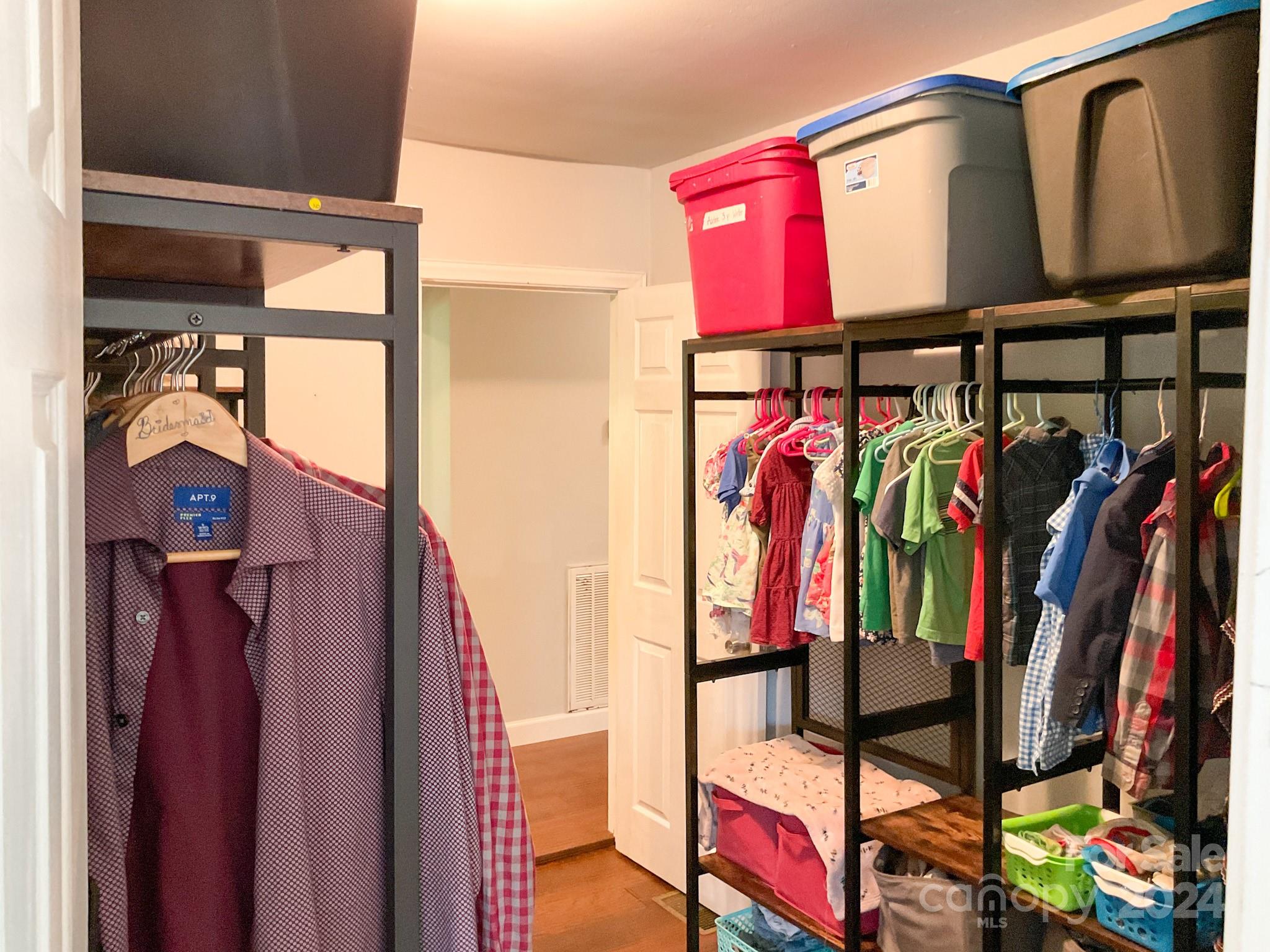 131 State Rd S-42-742 Wellford, SC 29385 - Photo 18 of 38 a view of walk in closet with clothes