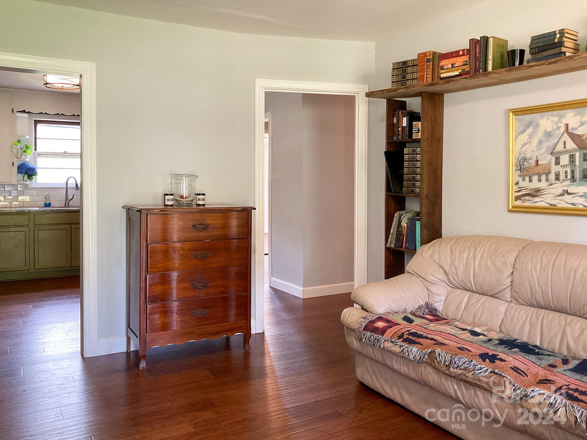 131 State Rd S-42-742 Wellford, SC 29385 - Photo 5 of 38 a living room with furniture and wooden floor