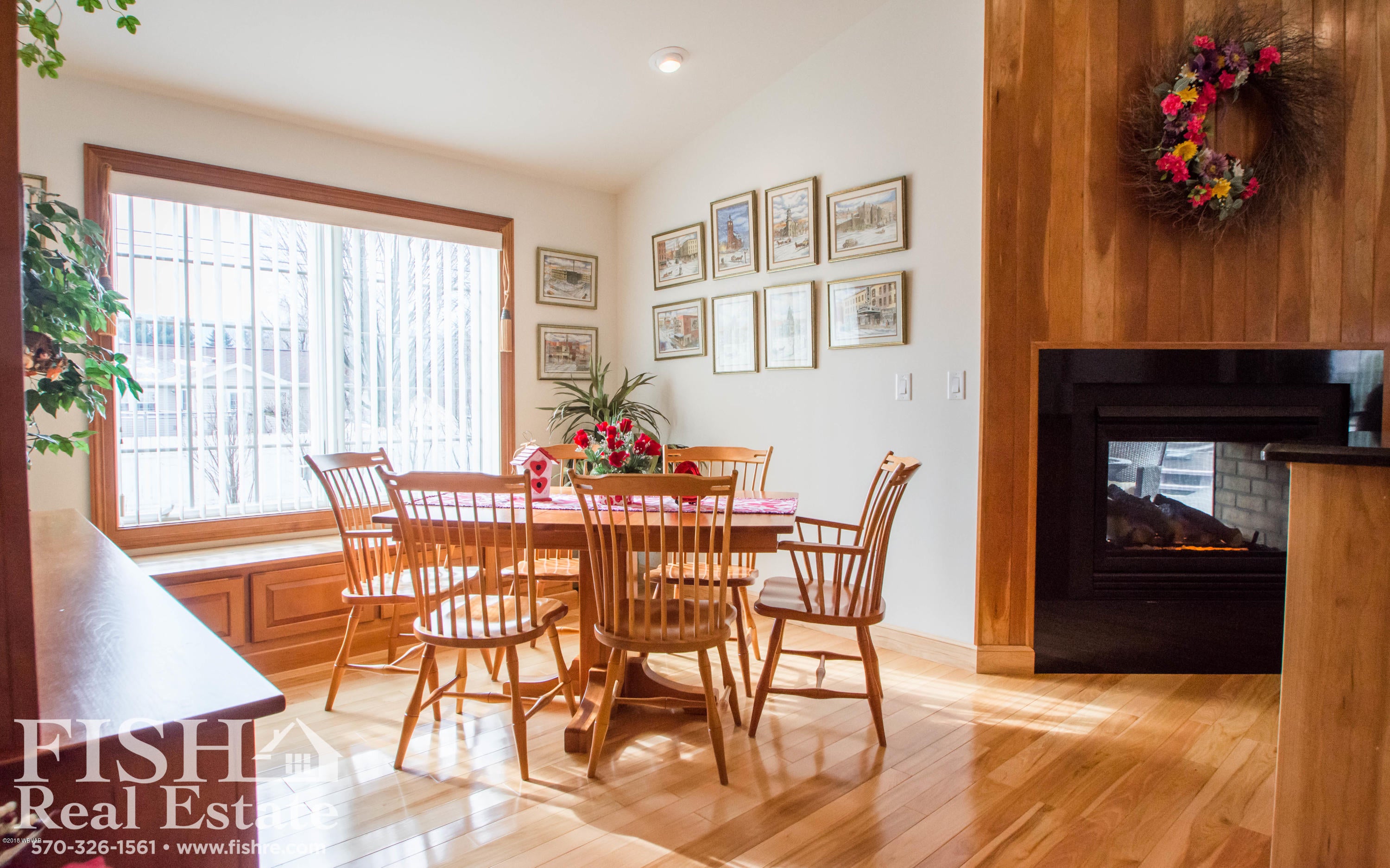 1220 Arthur Road Montoursville, PA 17754 - Photo 10 of 19 South Facing Breakfast Room & See Thru Gas Fireplace