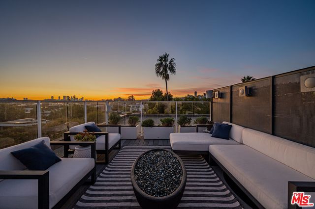 a view of a couches in the roof deck