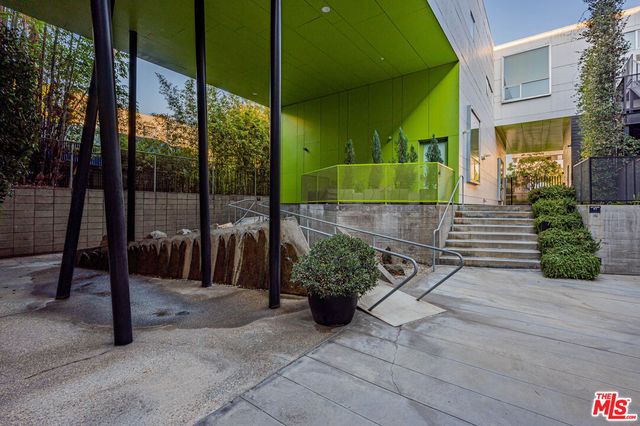 a aerial view of a house with a yard
