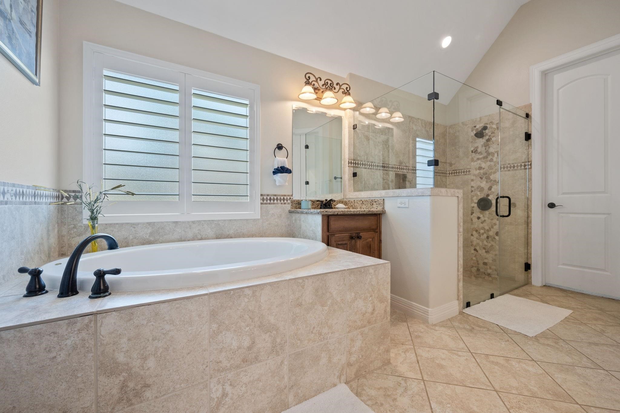 137 Silverwood Ranch Drive Shenandoah, TX 77384 - Photo 20 of 37 Primary bathroom features a soaking tub, double sinks, large shower and his and her closets.