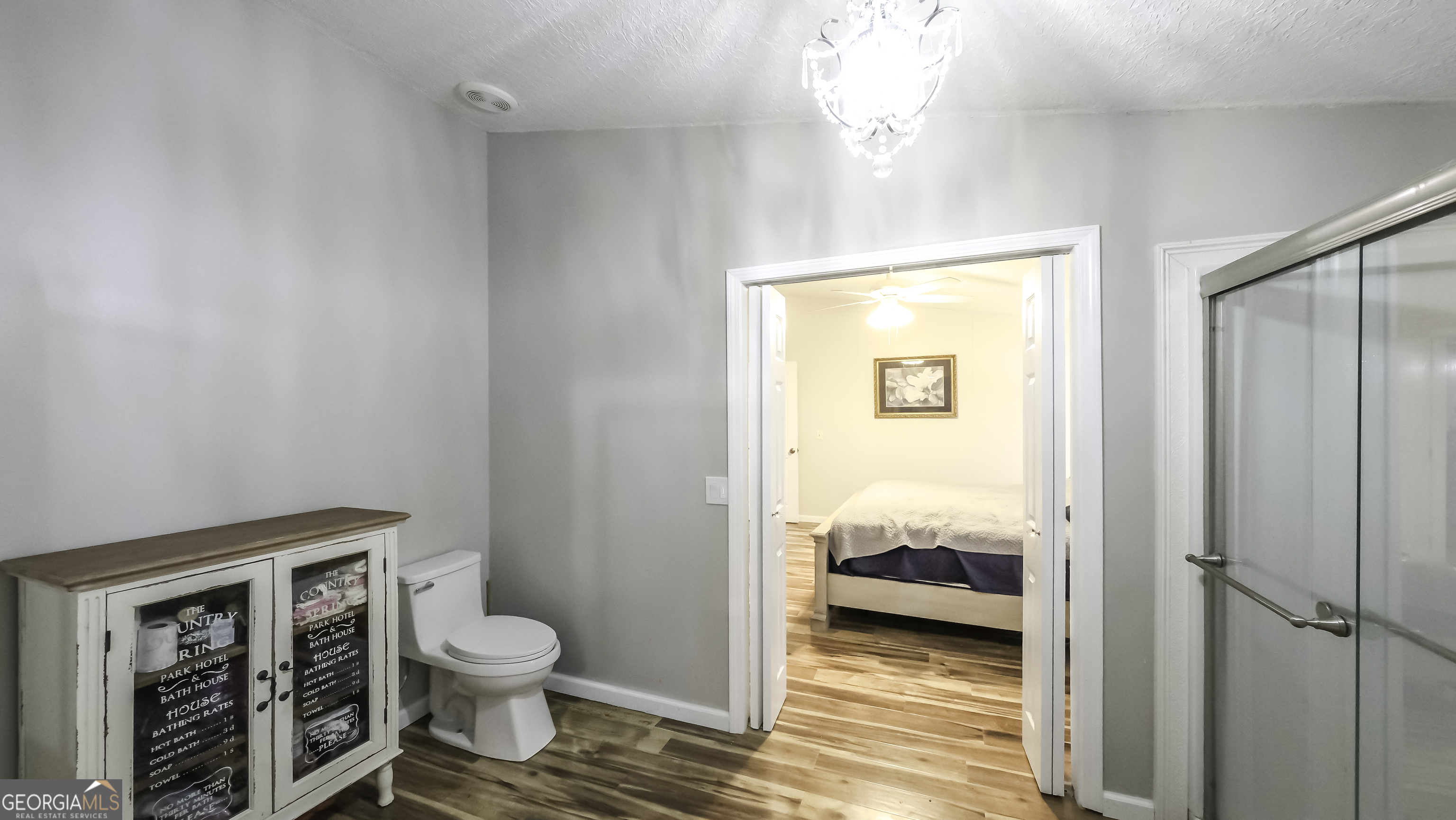 91 Holder Road Temple, GA 30179 - Photo 25 of 40 a bathroom with a toilet shower and a window