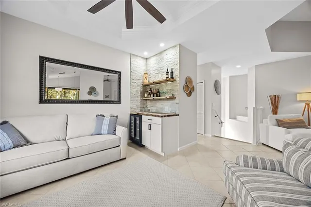 a living room with furniture and a couch