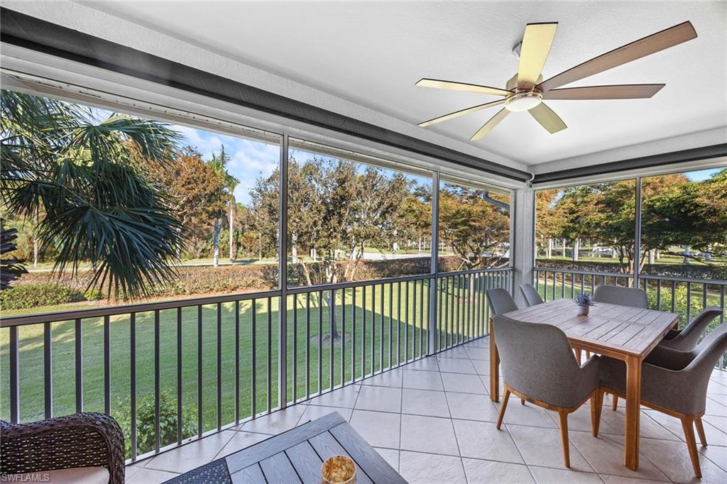 6864 Ascot Drive, Unit 5202 Naples, FL 34113 - Photo 30 of 36 a view of a dining room with furniture window and outside view