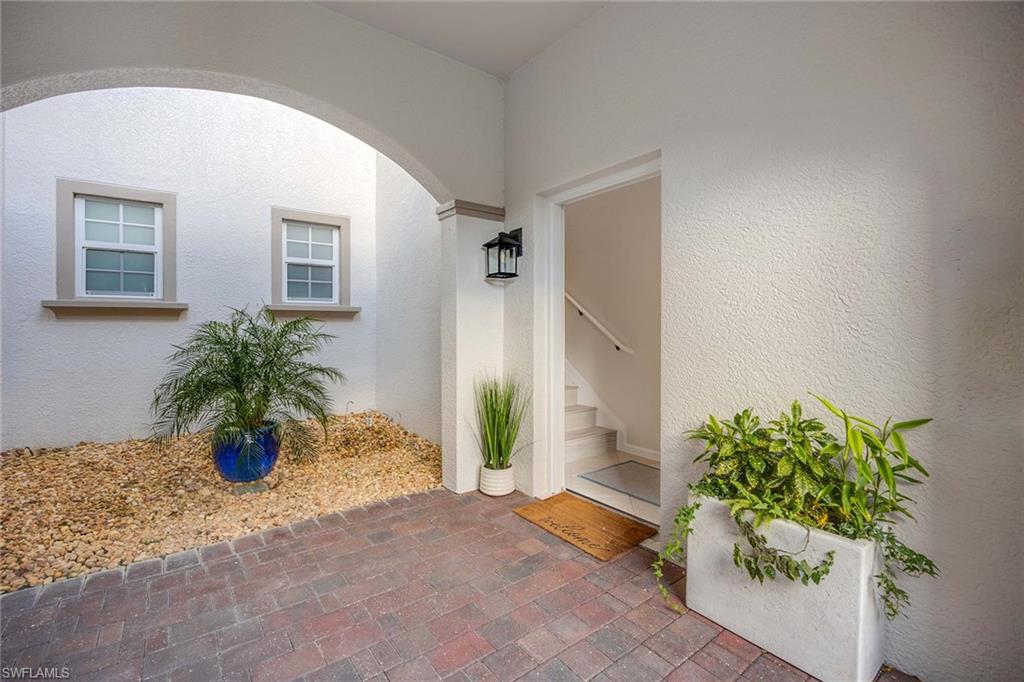 6864 Ascot Drive, Unit 5202 Naples, FL 34113 - Photo 5 of 36 a view of livingroom with entryway