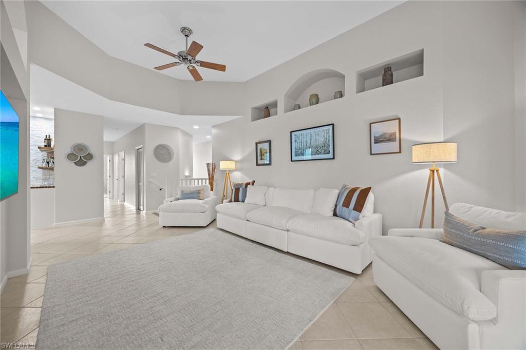 6864 Ascot Drive, Unit 5202 Naples, FL 34113 - Photo 8 of 36 a living room with furniture