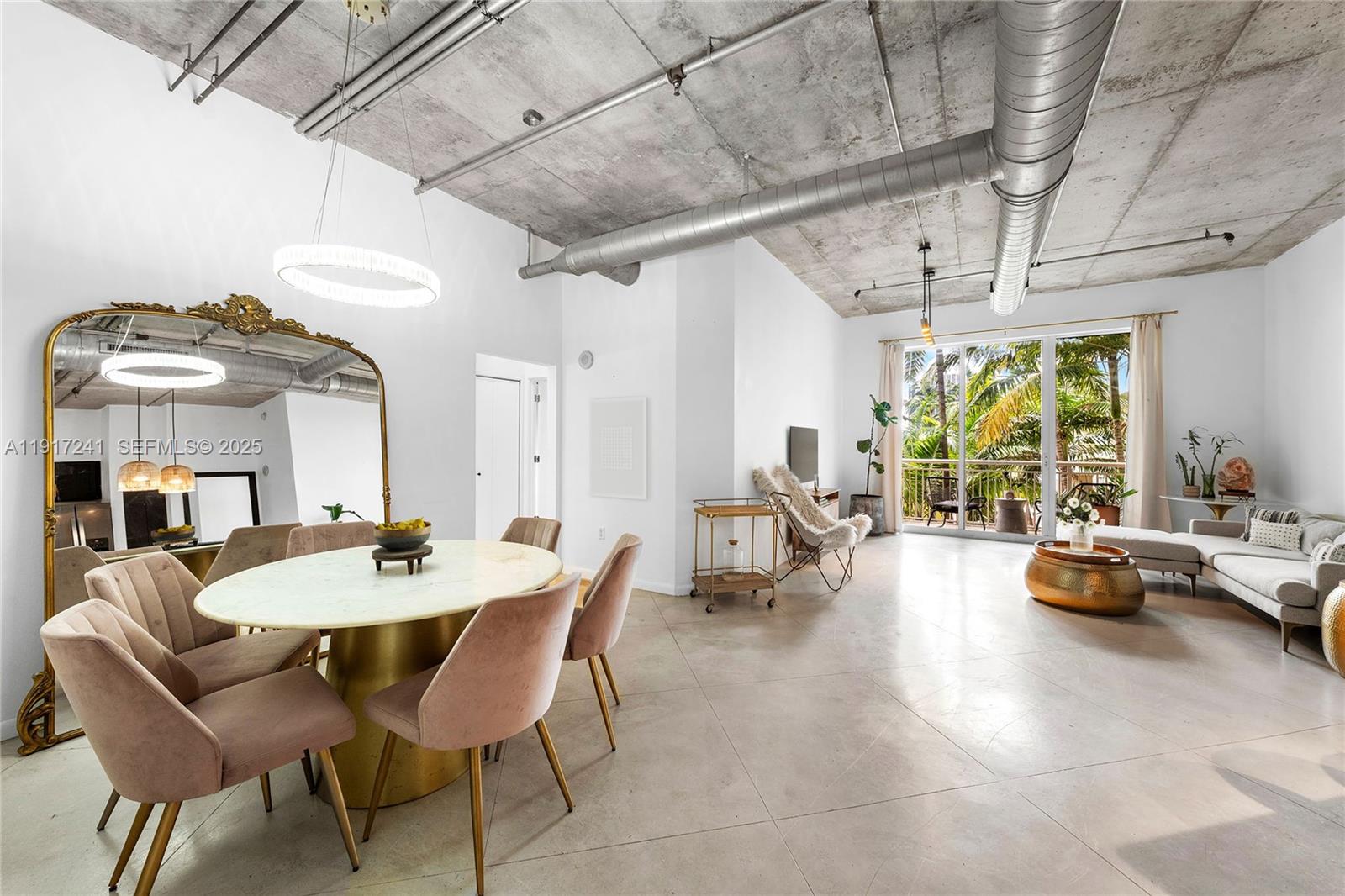 2001 Biscayne Boulevard, Unit 2409 Miami, FL 33137 - Photo 3 of 48 a view of a dining room with furniture window and outside view